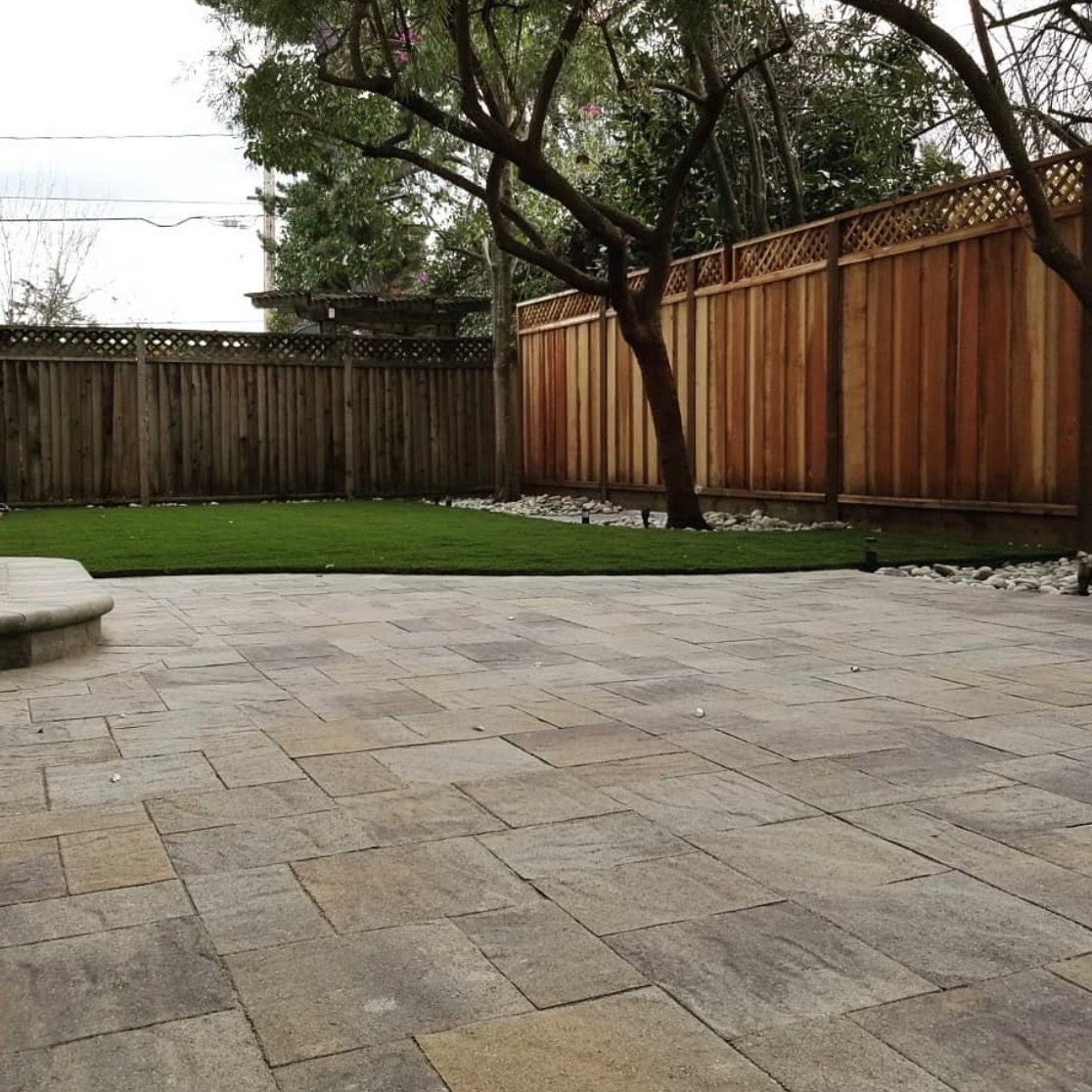 Paver patio with turf and landscaping